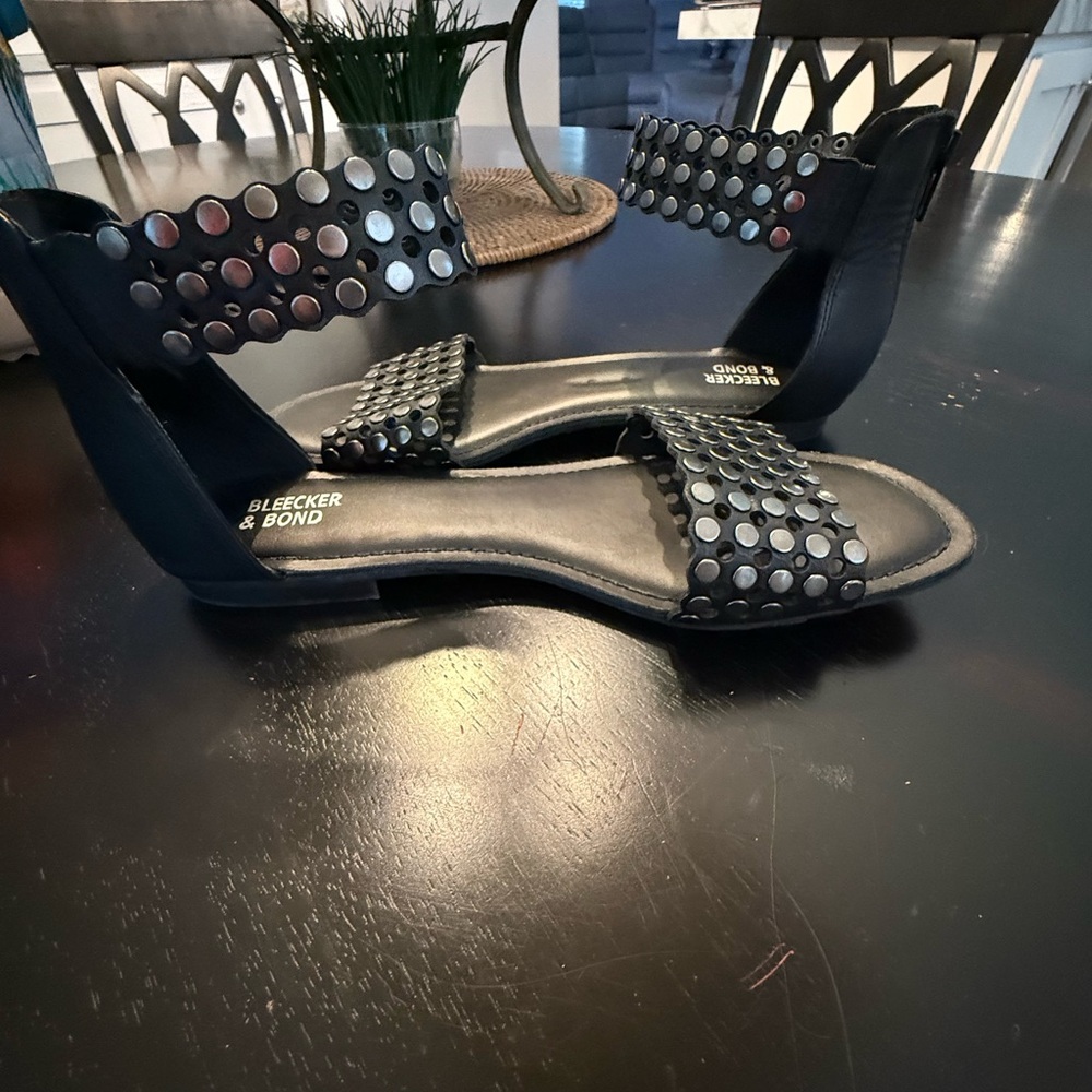 Black Woven Flat Sandals with Metallic Accents